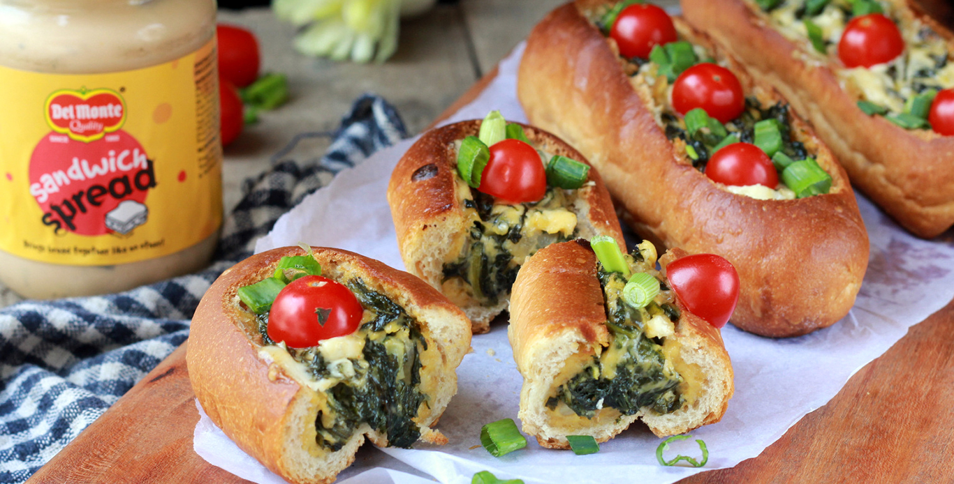 Bread boats filled with spinach eggs Del Monte Sandwich spreadÂ 